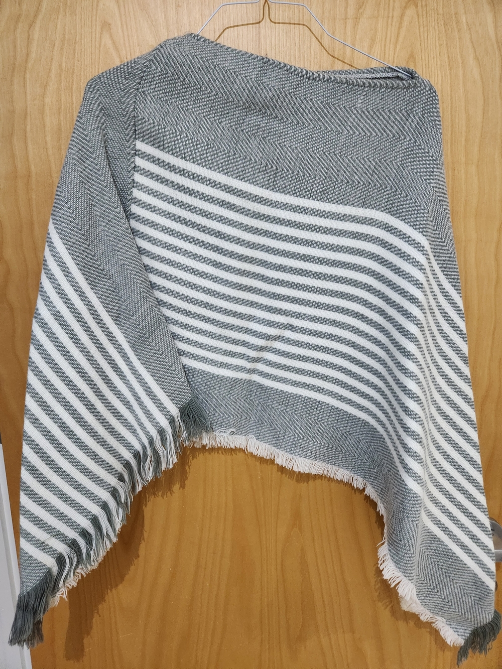 Francesca's Collections Gray and White Striped Knit Poncho